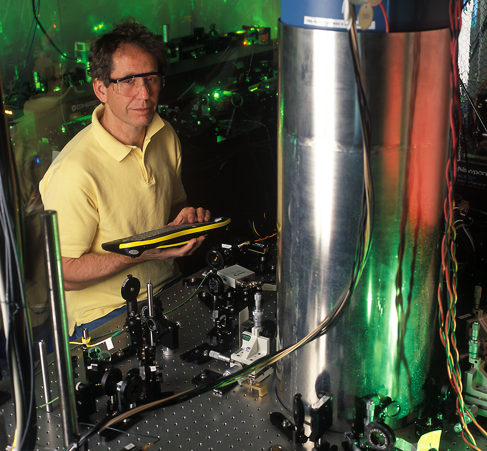 NIST physicist Jim Bergquist with the mercury-ion atomic clock