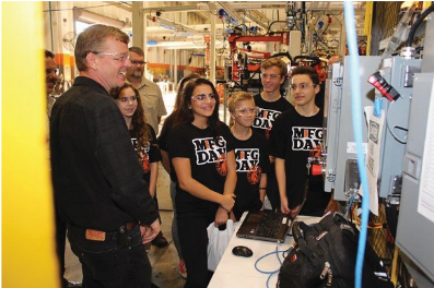 STEM students fascinated by manufacturing.