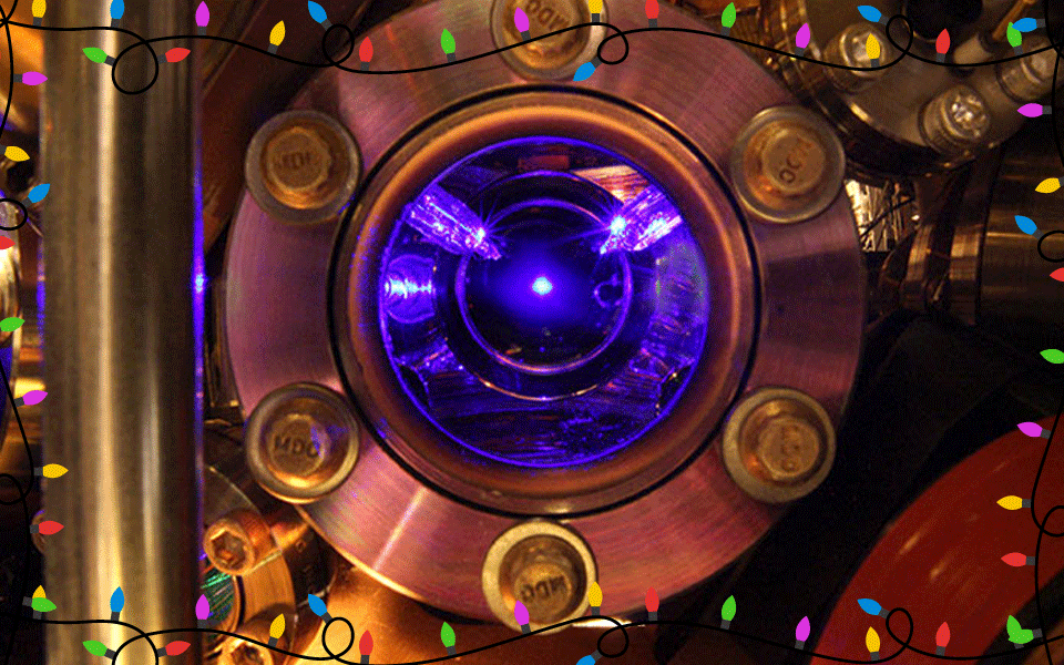 Purple light shines from a circular opening with metal frame like a porthole. 