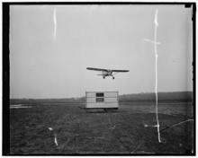 image of a Curtiss Fledgling airplane coming in for a landing