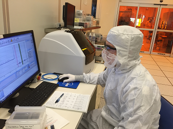 Alex Galli monitors a profilometer using quality control software he implemented and configured during his internship at the CNST.