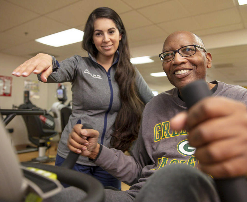 Adventist Health White Memorial employee working with a patient in Cardiac Rehab.