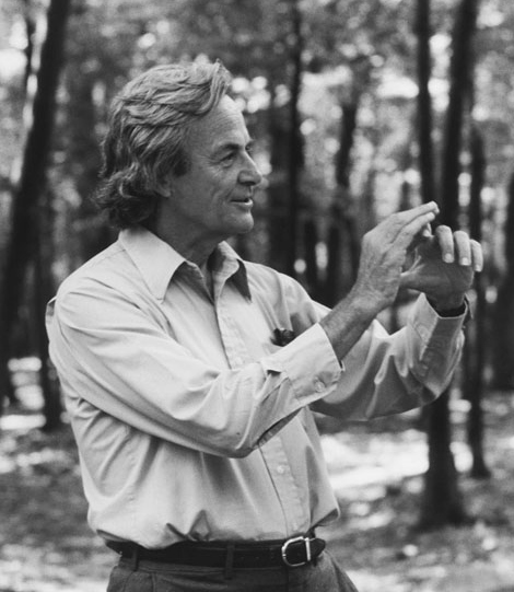BW photo of Richard Feynman standing in the Paine Mansion Woods in 1984