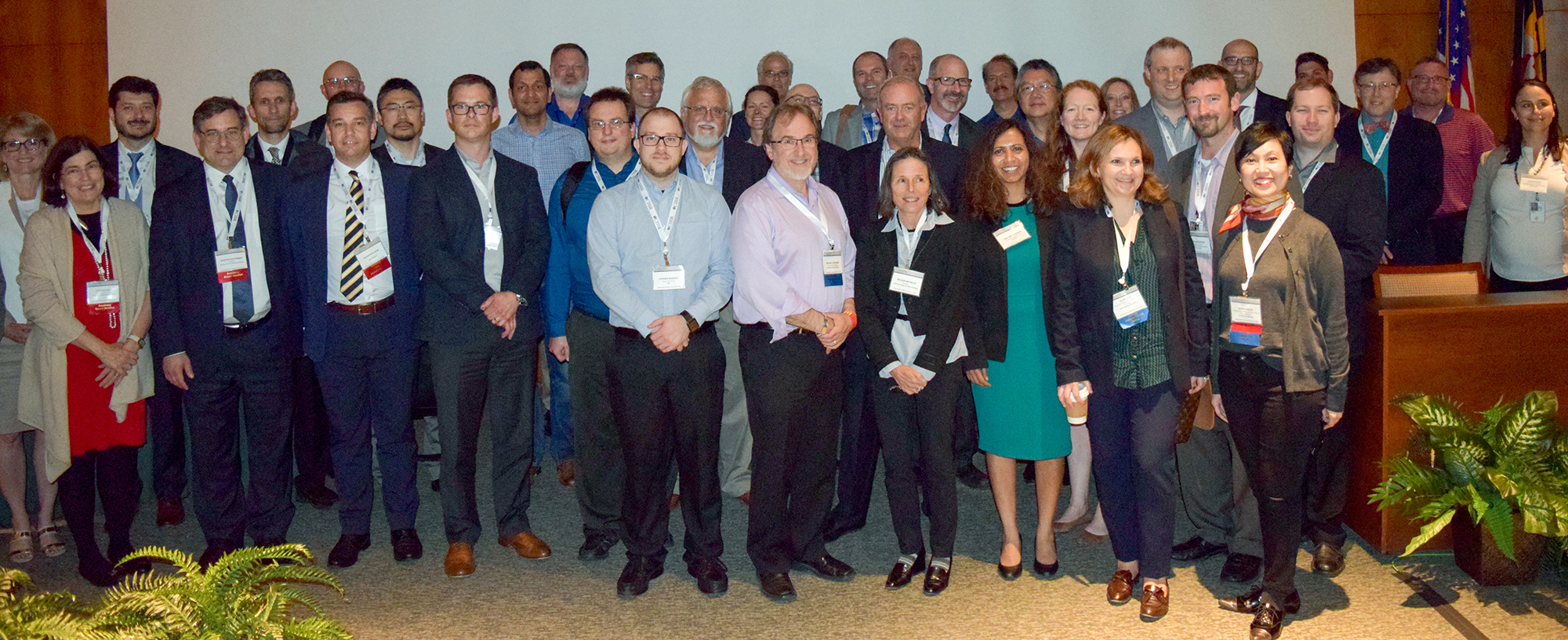 large crowd of AI and bioimaging experts posing for a photo