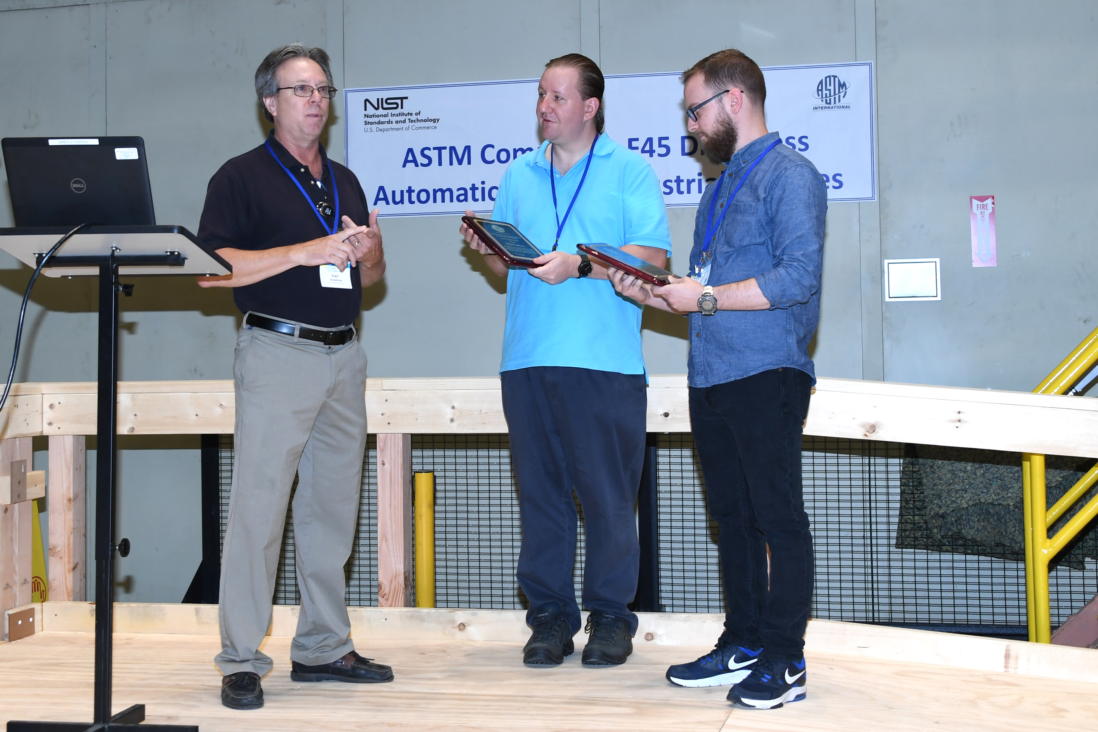 Adam Norton and Matt Lafary receive ASTM award of Appreciation with Roger Bostelman