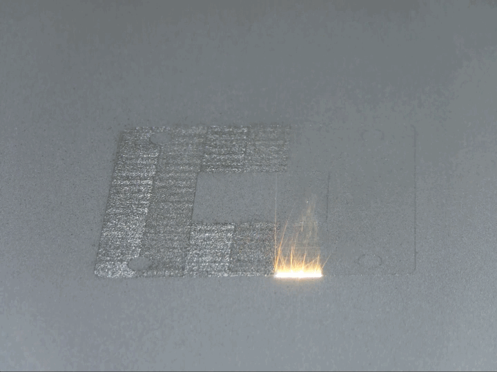High-power laser melts think layers of powder to create a part