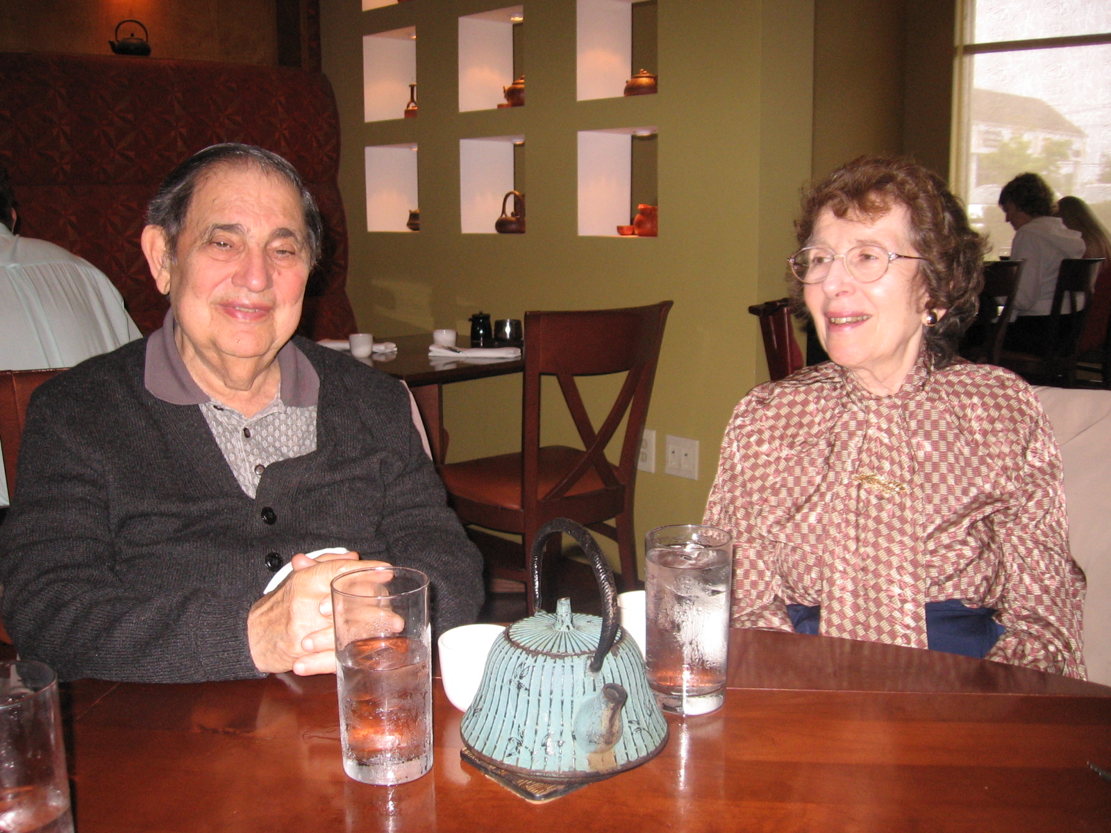 A man and a woman sitting at a table