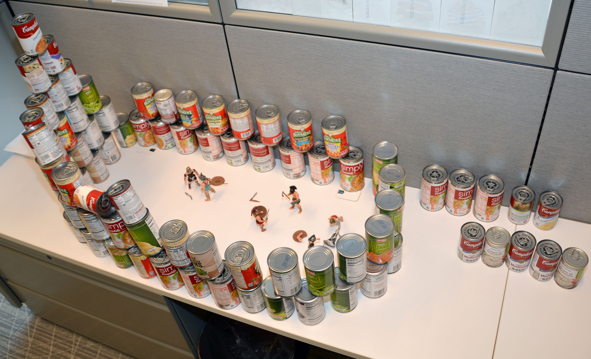 A tower of cans in the form of a gladiator arena for the 2019 CFC CANstruction Food Drive at the Census Bureau