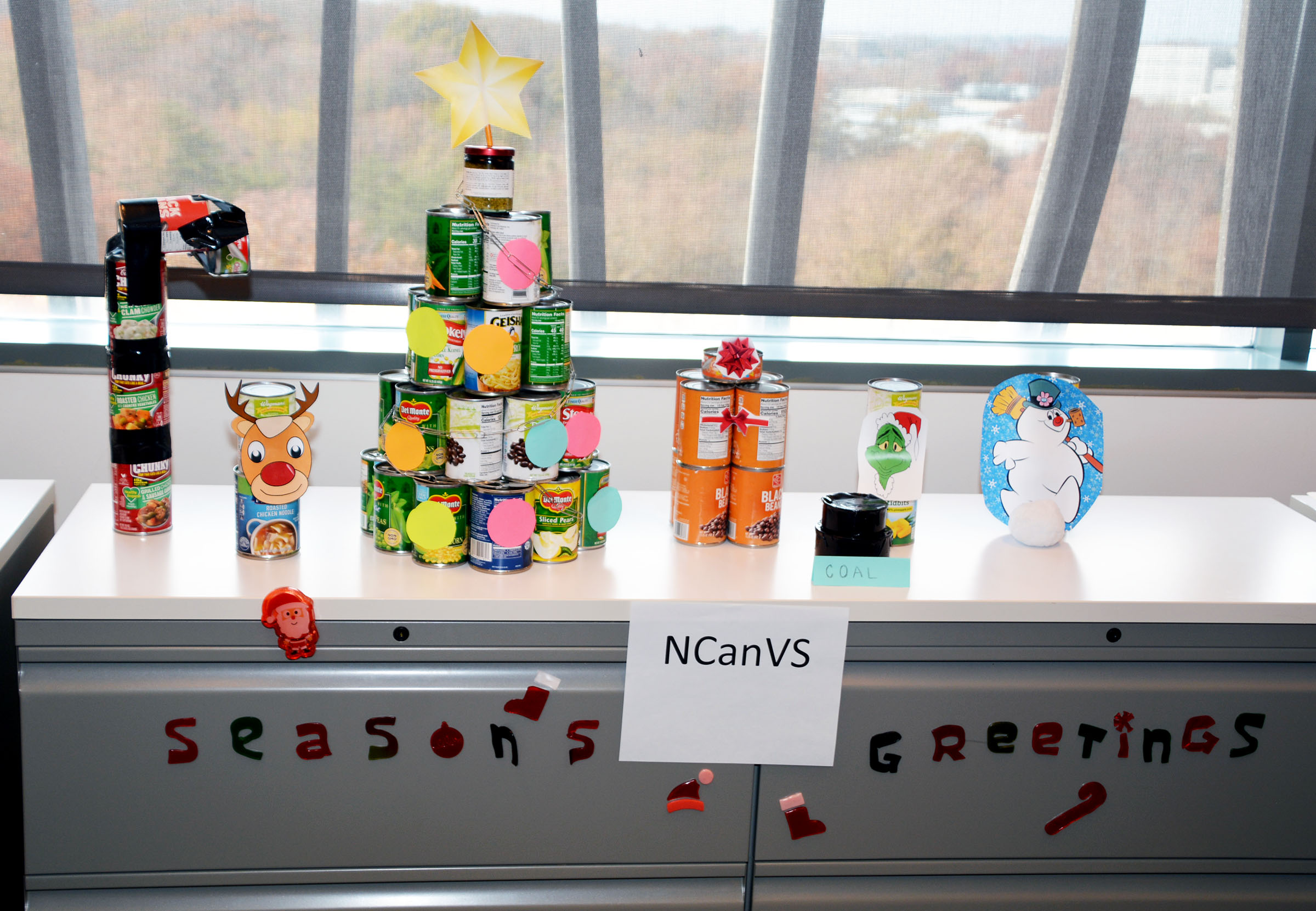 Towers of cans in the shapes of holiday decorations for the 2019 CFC CANstruction Food Drive at the Census Bureau