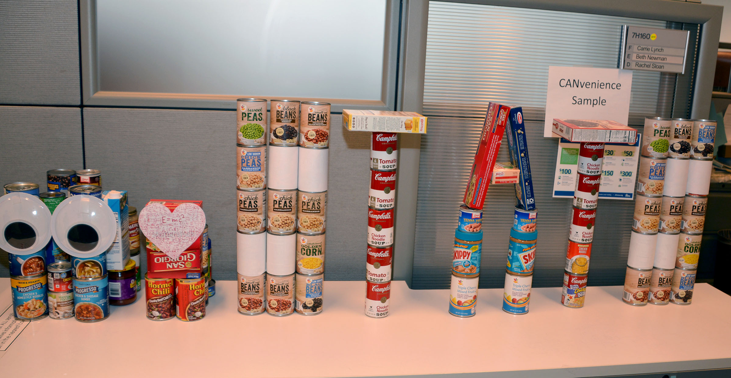  Towers of cans spelling out "STATS" for the 2019 CFC CANstruction Food Drive at the Census Bureau