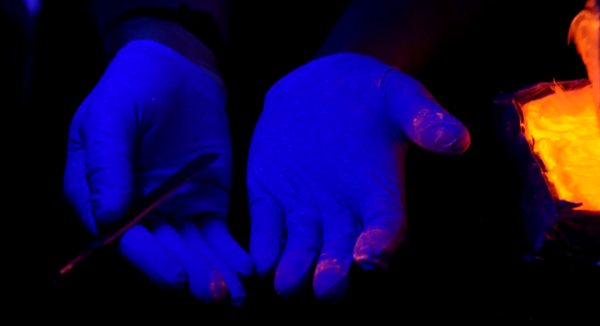 In Glowing Colors: Seeing the Spread of Drug Particles in a Forensic Lab