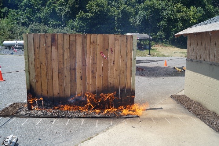 A single fence panel burning