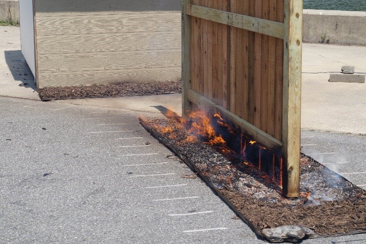 A single fence panel burning