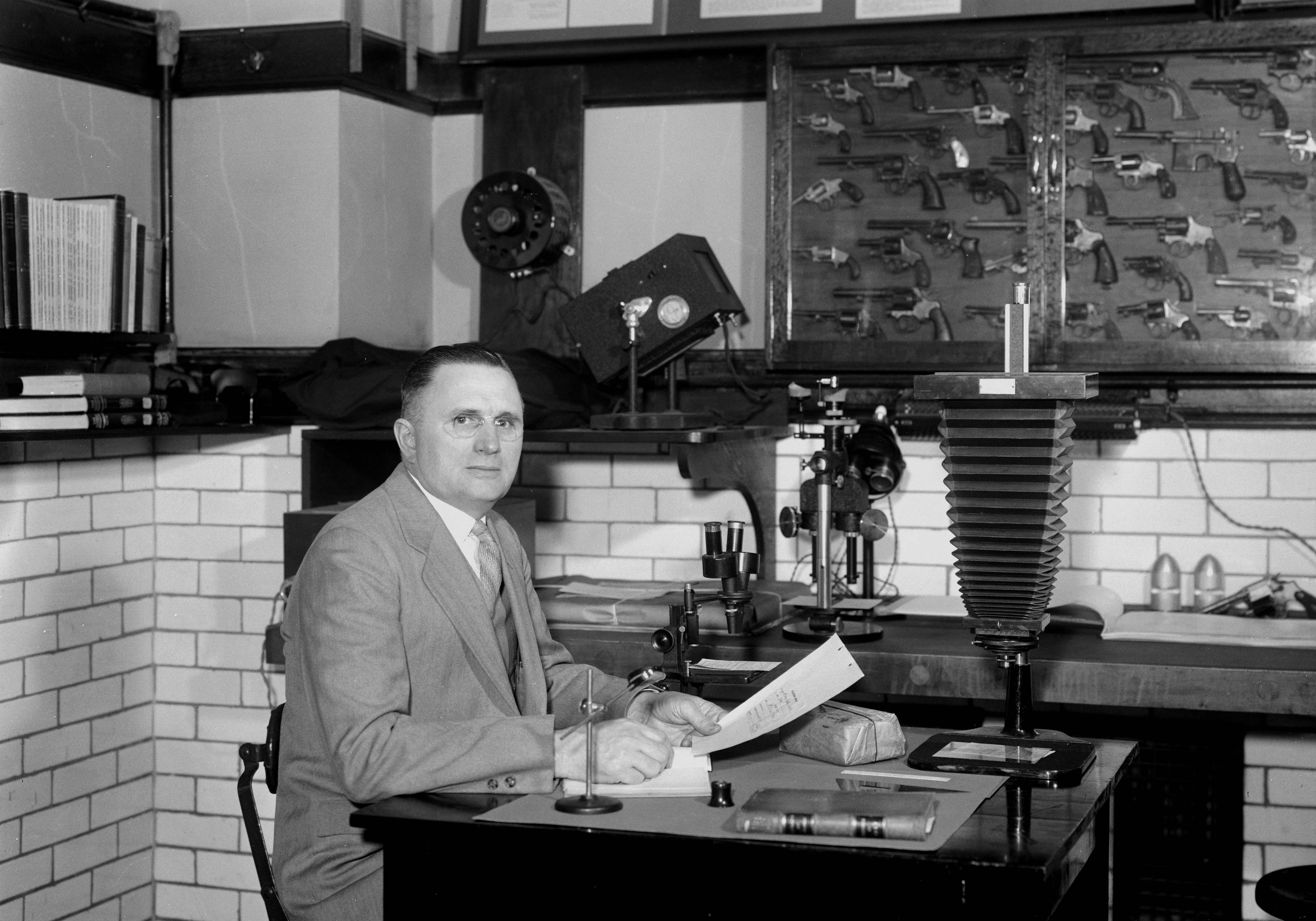 Dr. Wilmer Souder in the National Bureau of Standards Identification Laboratory.