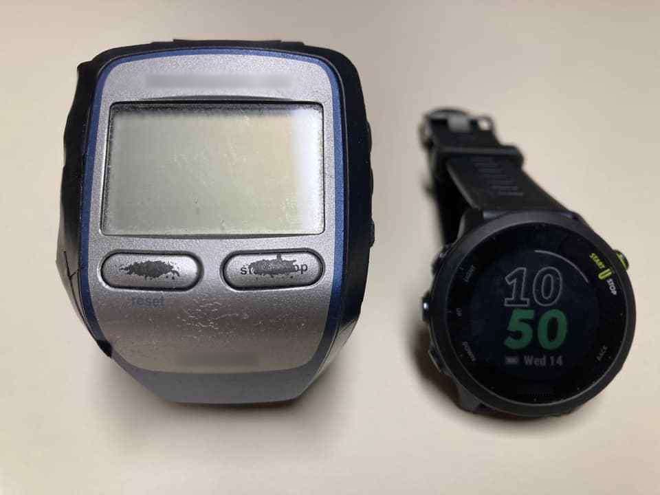 Large, worn running watch on the left; small, newer running watch on the right. 