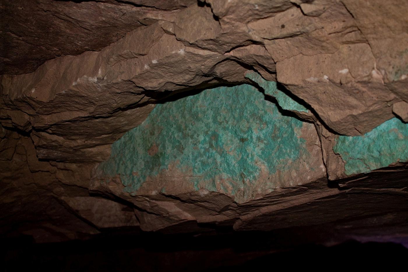 An image of the inside of a Wadi Faynan mine. The blue coloring shows a vein of copper.