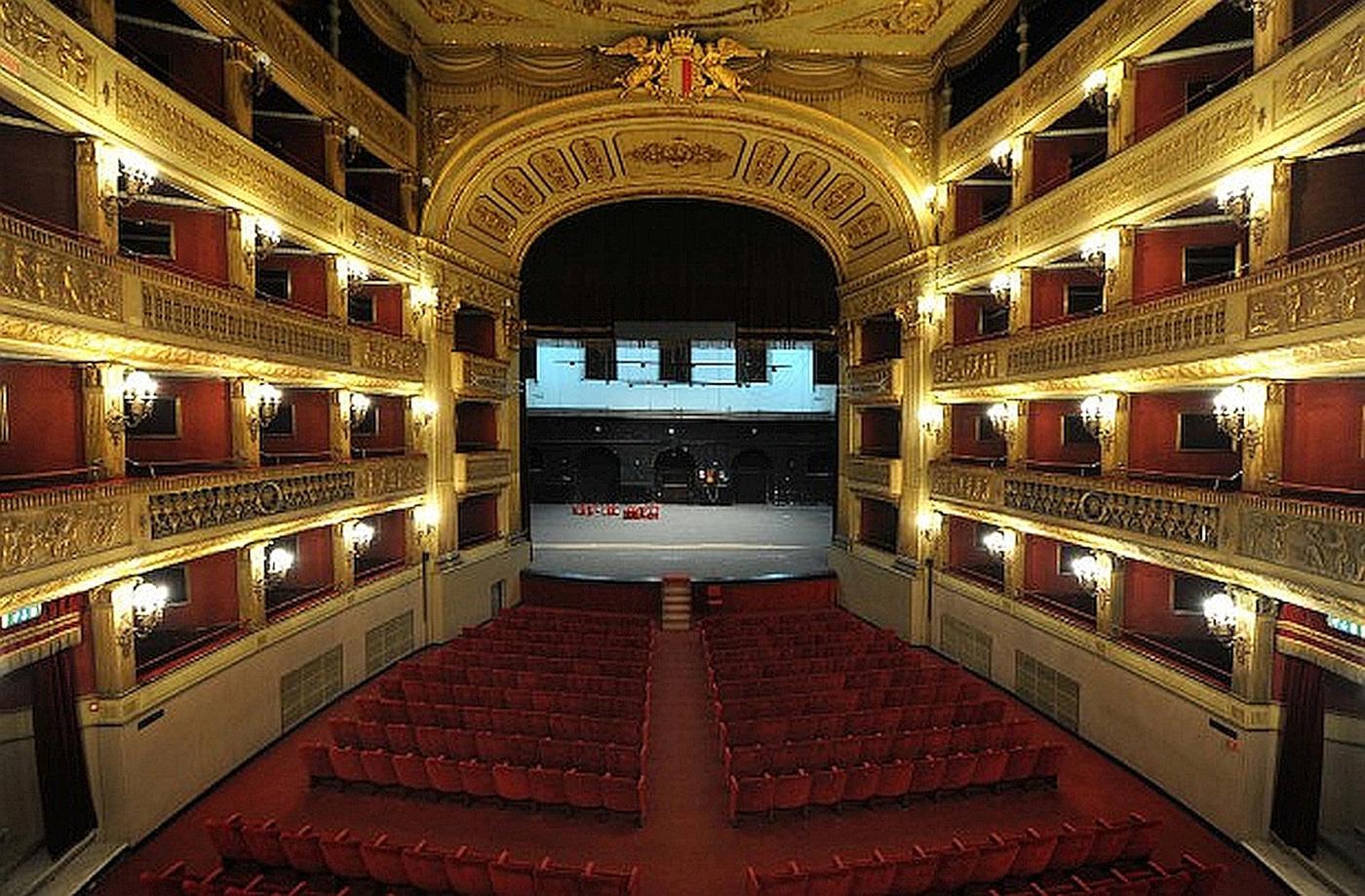 Interior of the Teatro Piccinni: Horseshoe-shaped performance area with four tiers of boxes