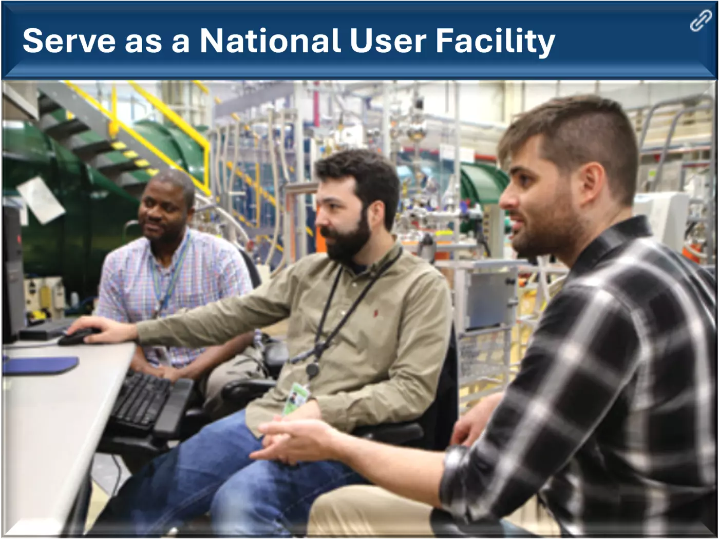 Serve as a National User Facility: Three researchers collaborating at a computer workstation