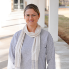 Justyna Zwolak poses for a casual photo outdoors on the NIST campus.