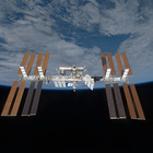 View of the International Space Station with the curve of the Earth in the background. 