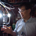 Side shot of Jun Ye in his lab