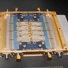 An array of sensors appear as a set of rectangles within a gold-colored metal frame.