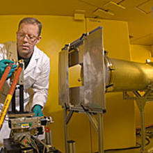 NIST scientist David Jacobson prepares an experimental fuel cell for real-time imaging