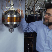 Mike Moldover with the spherical acoustic chamber.