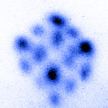 image 2 (of 3) of colorized images that show strontium atoms forming a "cube"