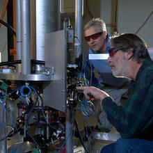 NIST physicists Steve Jefferts and Tom Heavner  with the NIST-F2 cesium fountain atommic clock
