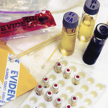 Test tubes, evidence bags, etc., from a forensics laboratory