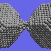 Computer simulations demonstrate the material extension and necking that occurs during the separation of crystalline silica nanoparticles.
