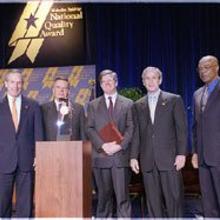 Pictured (Left to right): Commerce Secretary Don Evans; Quinton C. Van Wynen, president of the board of education, Pearl River School District; Richard Maurer, superintendent of schools, Pearl River School District; President Bush; Education Secretary Rod