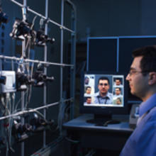 NIST computer scientist Ross Micheals demonstrates a NIST-developed system for studying the performance of facial recognition software programs.