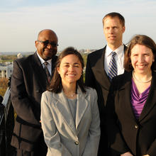 NIST's Associate Director for Laboratory Programs Willie May with NIST PECASE winners Joseph Kline, Ana Maria Rey and Gretchen Campbell