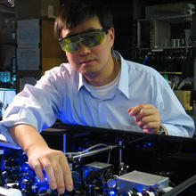 Photo of NIST physicist Jun Ye with his strontium atomic clock