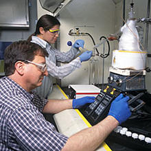 NIST chemists Thomas Bruno and Beverly Smith analyze complex fuel mixtures with the new advanced distillation curve apparatus.