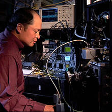 NIST engineer Sae Woo Nam working on a photo detector