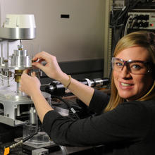 Biomedical engineer Jenni Popp with NIST's prototype bioreactor for tissue engineering.