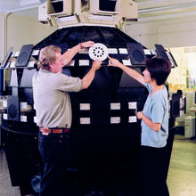 Photo of researchers from France's National Scientific and Technological Institute and NIST with the SPHERE