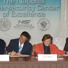 Photo of MOU signing for NCCoE