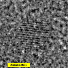 A high-resolution transmission electron microscope photograph of a single silicon nanoparticle.