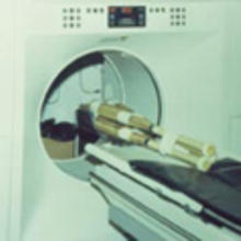 Four baseball bats undergo a CAT scan