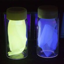 Examples of the silk used in experiments to detect damage in composites, shown under black light.