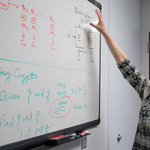 Lily Chen at her whiteboard