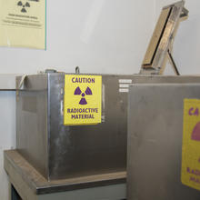 Silver box with radioactive materials sign