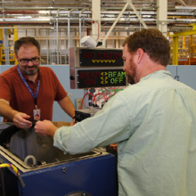 An image of two researchers at a neutron beamline working with the nSoft consortium