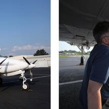 Three scientists crouch below the belly of an aircraft.