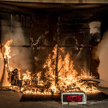 The fire has consumed not only the Christmas tree, but also a chair, painting, coffee table and bookshelf