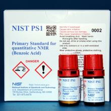 Photograph of NIST PS1 Primary Standard for Quantitative NMR (Benzoic Acid) showing labeled box and two labeled bottles. 